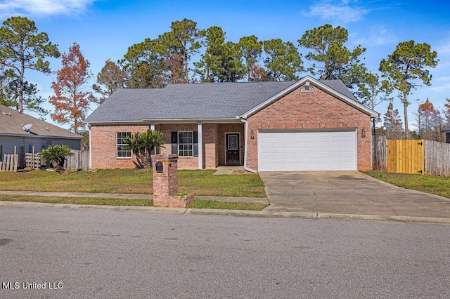 view of front facade with a garage and a front lawn