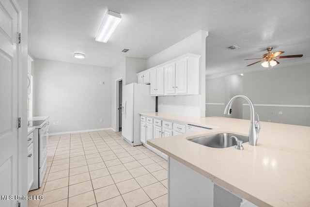 kitchen with ceiling fan, sink, light tile patterned flooring, white refrigerator with ice dispenser, and white cabinets