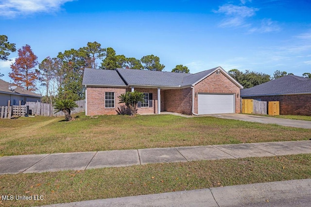 single story home with a front yard and a garage