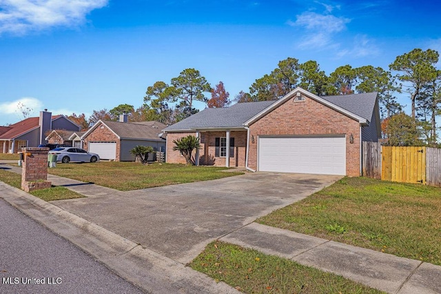 ranch-style house featuring a front lawn and a garage