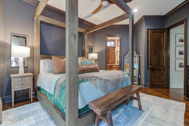 bedroom with ornamental molding, a ceiling fan, baseboards, and wood finished floors