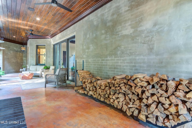 view of patio / terrace with an outdoor living space and a ceiling fan