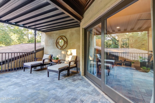 view of patio / terrace with a balcony