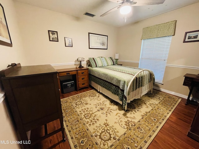 6324 Country Ln, Moss Point, MS 39562 - bedroom with wood finished floors, ceiling fan, and baseboards