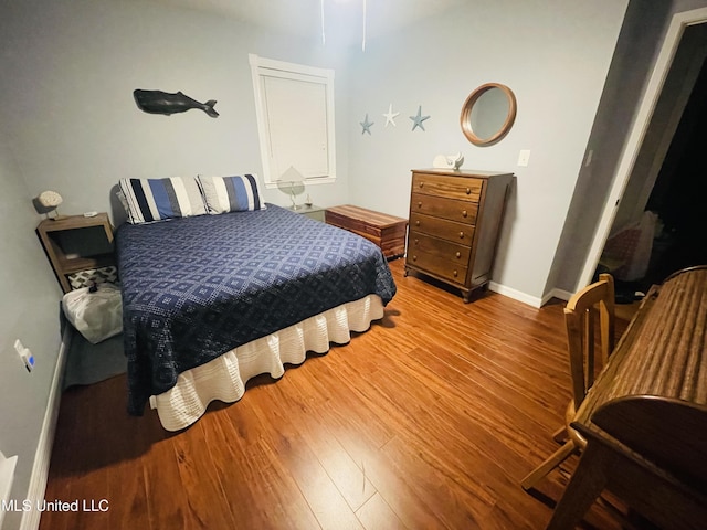 6324 Country Ln, Moss Point, MS 39562 - bedroom with wood finished floors and baseboards