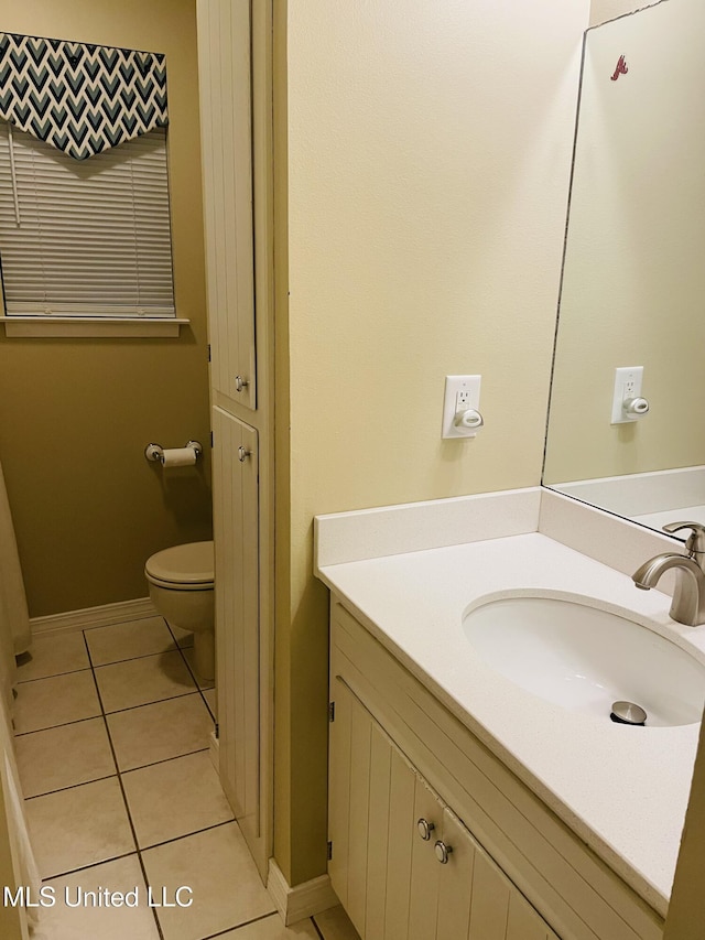 6324 Country Ln, Moss Point, MS 39562 - bathroom with vanity, toilet, and tile patterned floors