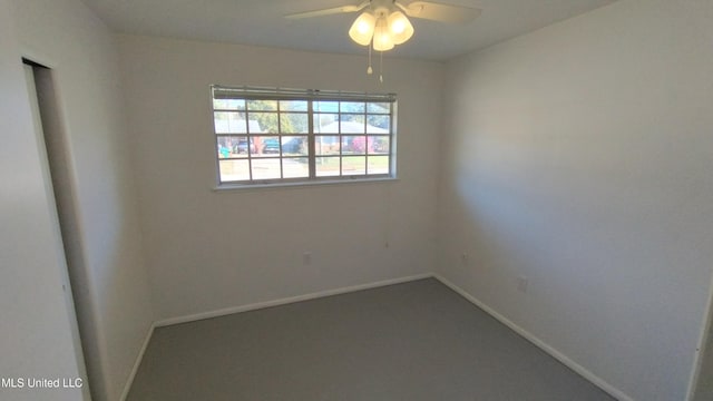 2610 Demaret Dr, Gulfport, MS 39507 - carpeted spare room featuring baseboards and a ceiling fan