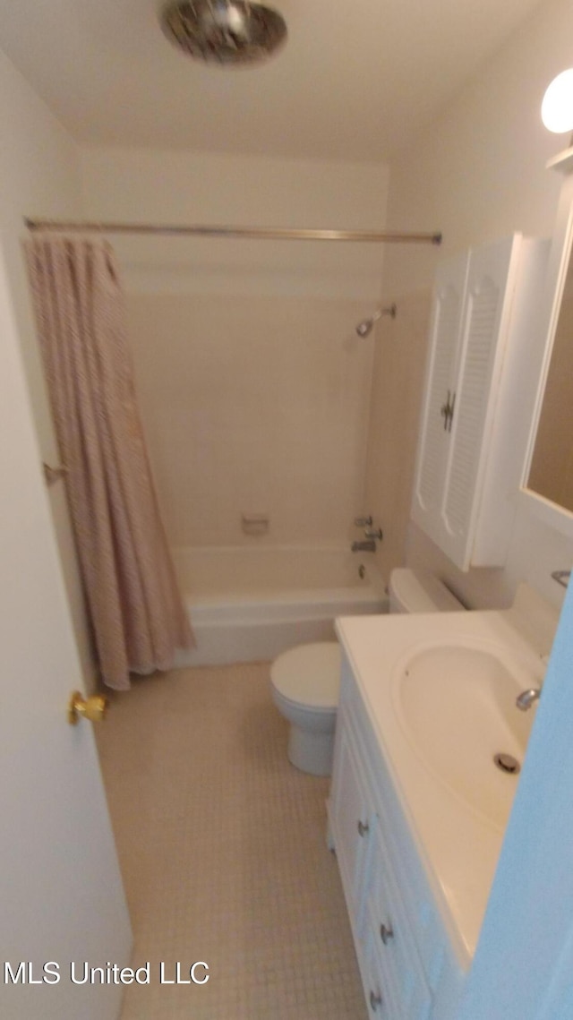 2610 Demaret Dr, Gulfport, MS 39507 - bathroom featuring vanity, shower / tub combo, toilet, and tile patterned floors