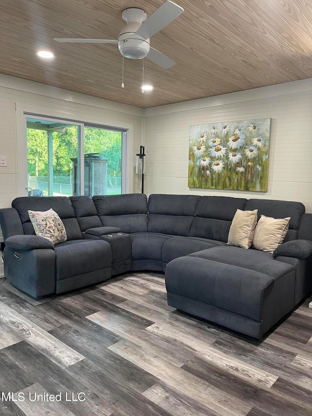 living room with ceiling fan, wood-type flooring, and wood ceiling