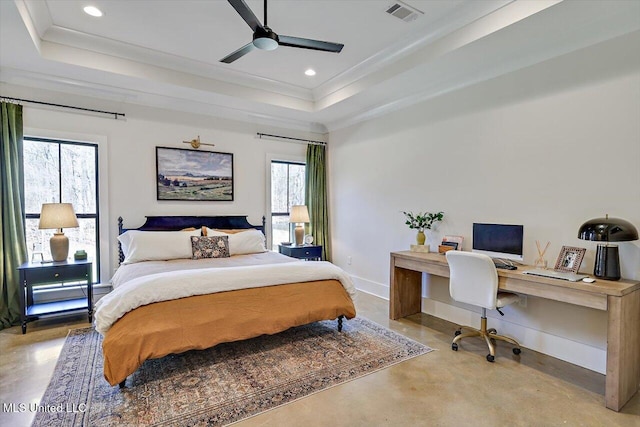 bedroom featuring finished concrete flooring, baseboards, a raised ceiling, and recessed lighting