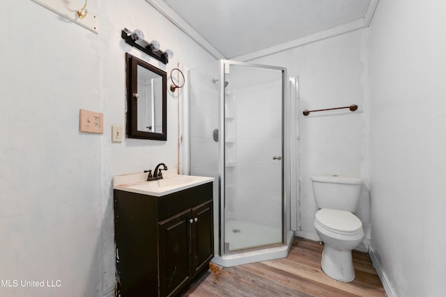 3902 Pascagoula St, Pascagoula, MS 39567 - full bathroom featuring toilet, wood finished floors, vanity, and a stall shower