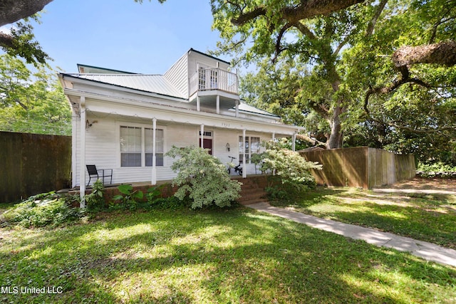 3902 Pascagoula St, Pascagoula, MS 39567 - view of front facade with covered porch and metal roof