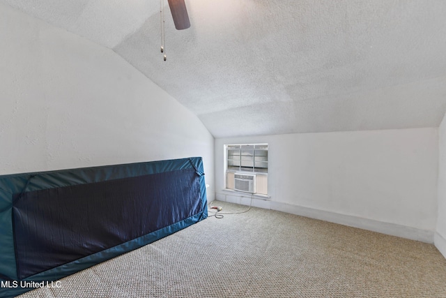 3902 Pascagoula St, Pascagoula, MS 39567 - bonus room featuring lofted ceiling, a textured ceiling, carpet flooring, a ceiling fan, and cooling unit