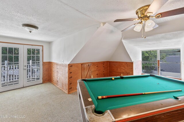 3902 Pascagoula St, Pascagoula, MS 39567 - playroom with a textured ceiling, wood walls, carpet, a wainscoted wall, and billiards table
