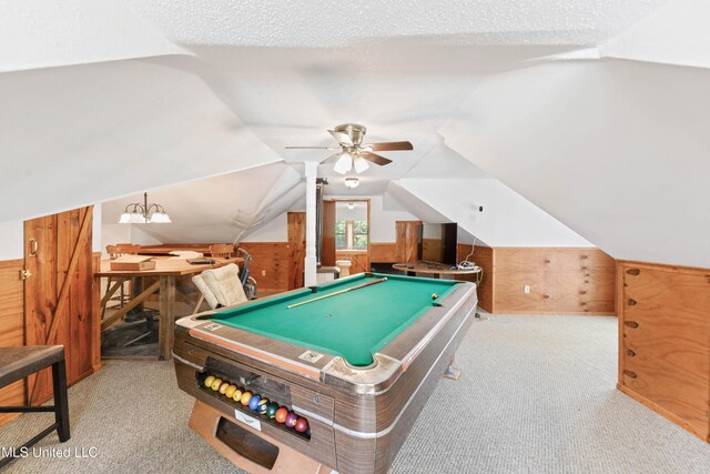 3902 Pascagoula St, Pascagoula, MS 39567 - game room with wooden walls, carpet, vaulted ceiling, a ceiling fan, and pool table