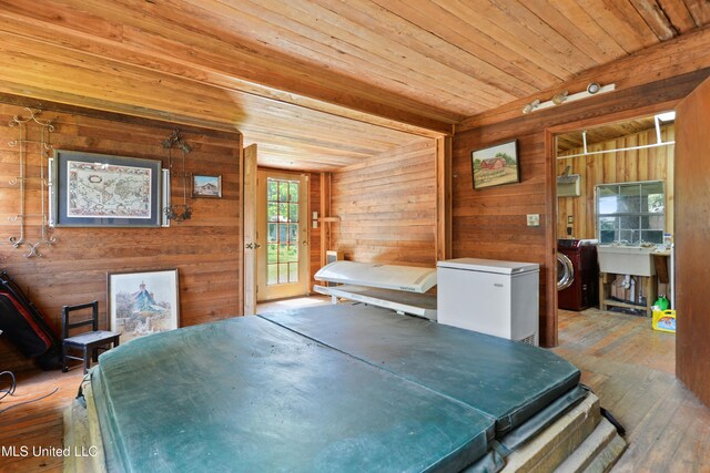 3902 Pascagoula St, Pascagoula, MS 39567 - recreation room featuring wood ceiling, wood walls, wood-type flooring, and a sink