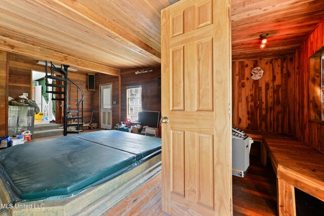 3902 Pascagoula St, Pascagoula, MS 39567 - recreation room featuring wood walls, wood ceiling, and hardwood / wood-style flooring