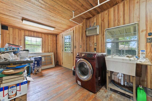 3902 Pascagoula St, Pascagoula, MS 39567 - washroom featuring washer / clothes dryer, a wall mounted AC, hardwood / wood-style flooring, wood ceiling, and wooden walls
