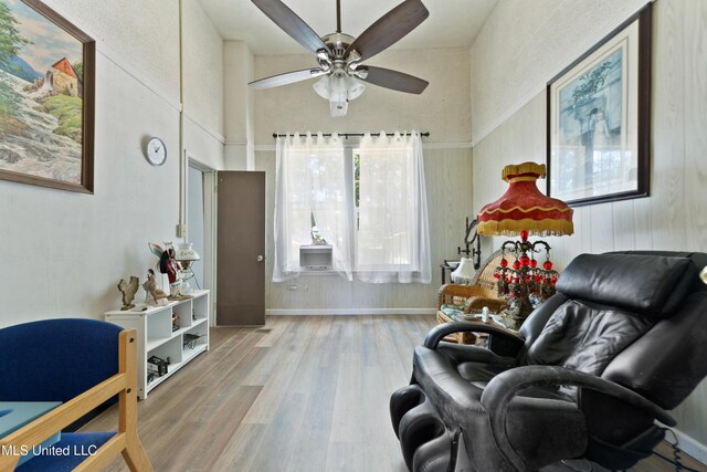 3902 Pascagoula St, Pascagoula, MS 39567 - sitting room with a ceiling fan, wood finished floors, and a high ceiling