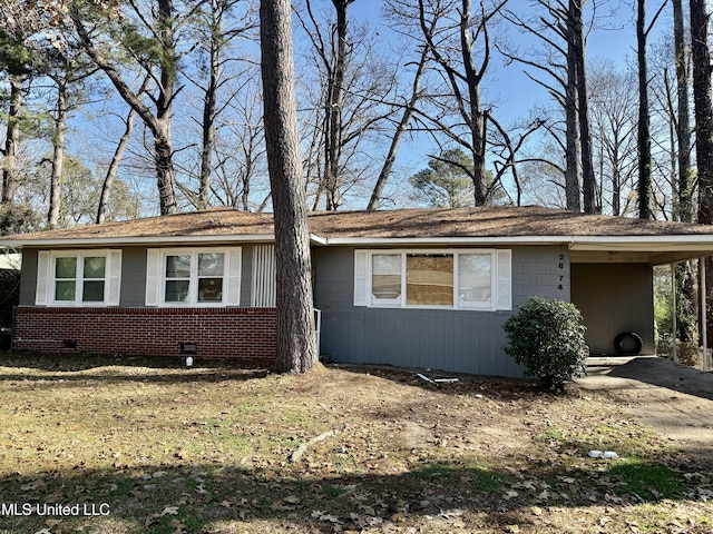 view of front of home with a carport