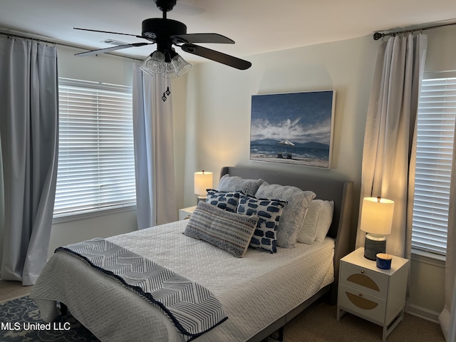 bedroom featuring ceiling fan and carpet flooring