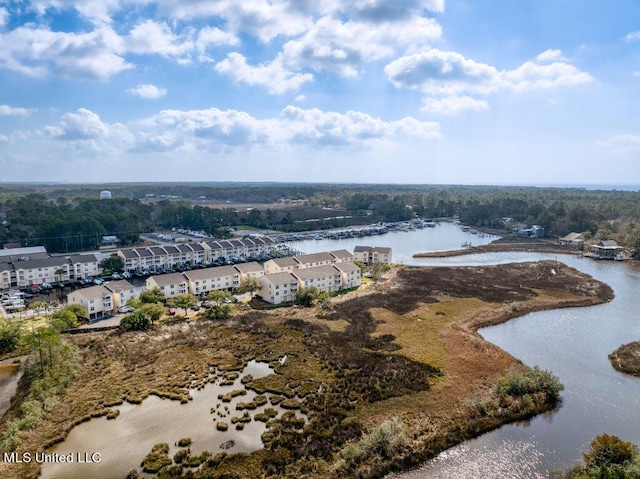 birds eye view of property featuring a water view