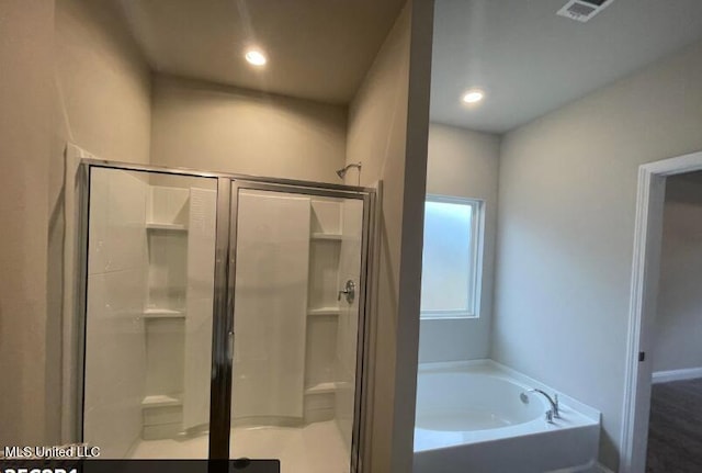 bathroom with a bath, visible vents, recessed lighting, and a stall shower