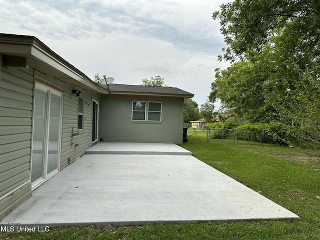 view of patio / terrace with fence