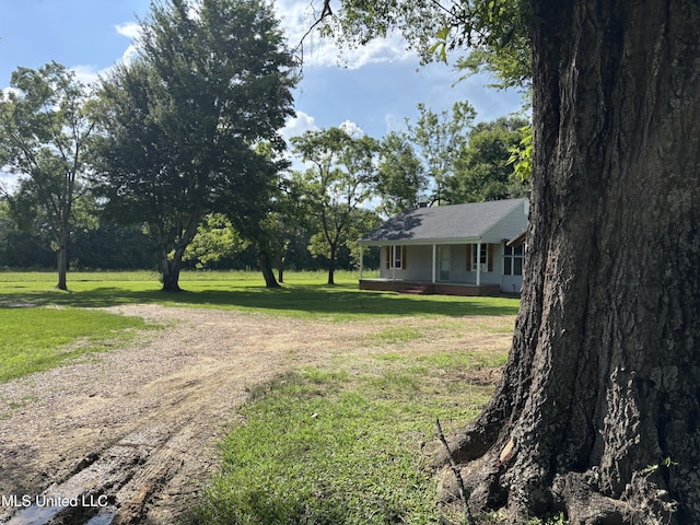 232 Renfroe Rd, Canton, MS 39046 - view of grassy yard with a porch