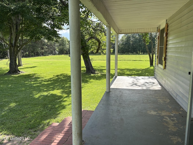 232 Renfroe Rd, Canton, MS 39046 - view of patio featuring view of scattered trees