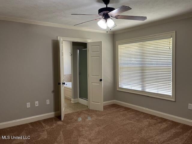 104 Blackstone Cir, Brandon, MS 39047 - unfurnished bedroom featuring carpet floors, ornamental molding, and a ceiling fan