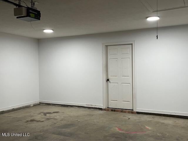 104 Blackstone Cir, Brandon, MS 39047 - empty room featuring attic access and concrete flooring