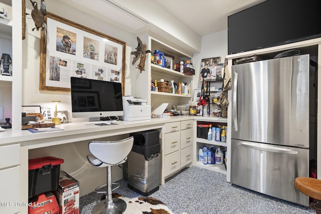 office area featuring built in desk