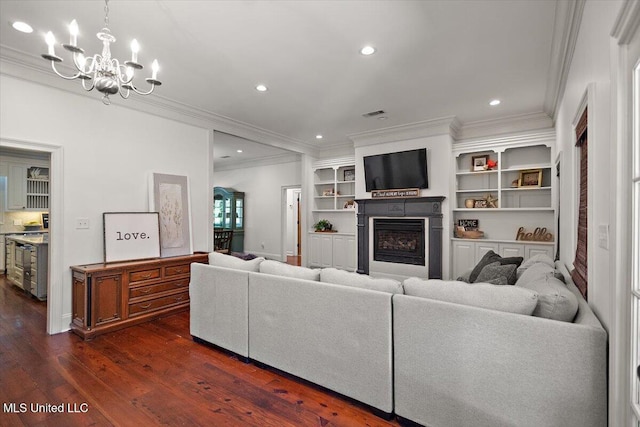 2003 Canterbury Pl W, Brandon, MS 39042 - living room with a chandelier, ornamental molding, dark wood-style floors, a fireplace, and recessed lighting