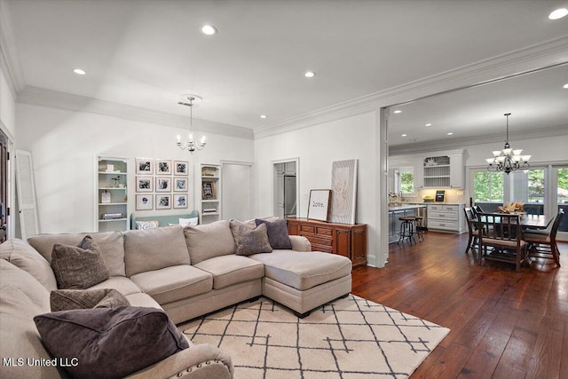 2003 Canterbury Pl W, Brandon, MS 39042 - living room featuring a chandelier, dark wood-style floors, recessed lighting, and ornamental molding