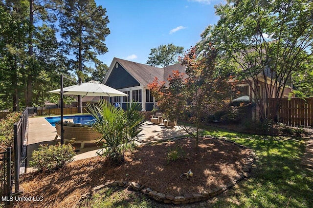 2003 Canterbury Pl W, Brandon, MS 39042 - rear view of property with a patio and a fenced backyard