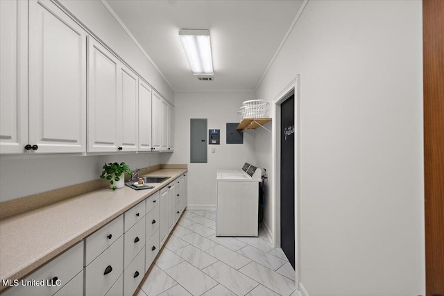 2003 Canterbury Pl W, Brandon, MS 39042 - laundry area featuring ornamental molding, washing machine and dryer, cabinet space, electric panel, and baseboards