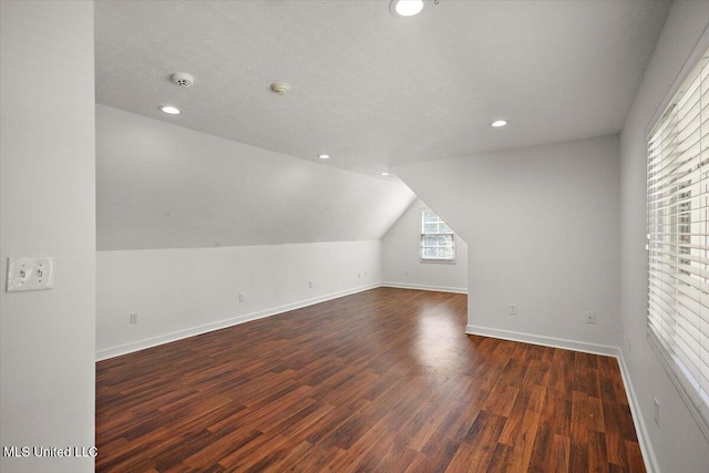 2003 Canterbury Pl W, Brandon, MS 39042 - bonus room featuring wood finished floors, baseboards, recessed lighting, and lofted ceiling