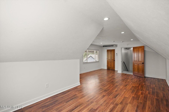 2003 Canterbury Pl W, Brandon, MS 39042 - bonus room with lofted ceiling, wood finished floors, recessed lighting, baseboards, and a wall mounted AC