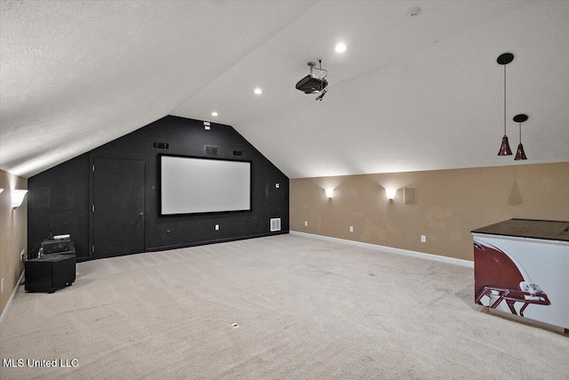 2003 Canterbury Pl W, Brandon, MS 39042 - carpeted home theater with baseboards, lofted ceiling, and recessed lighting