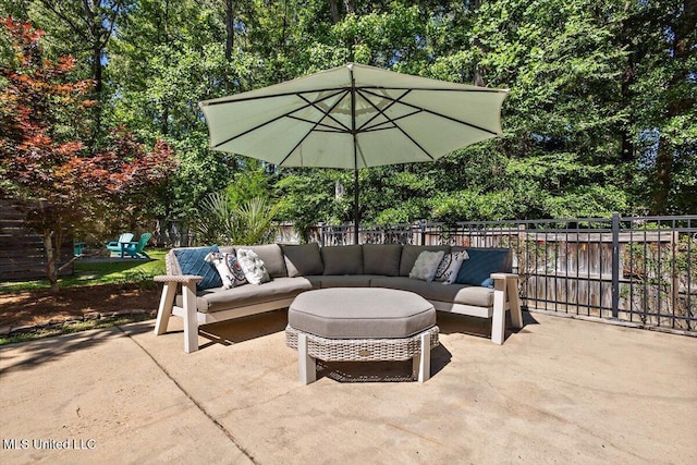2003 Canterbury Pl W, Brandon, MS 39042 - fenced backyard featuring outdoor lounge area, a patio, and view of scattered trees