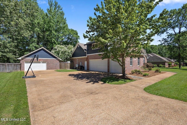 2003 Canterbury Pl W, Brandon, MS 39042 - view of front of house featuring brick siding, a garage, and concrete driveway