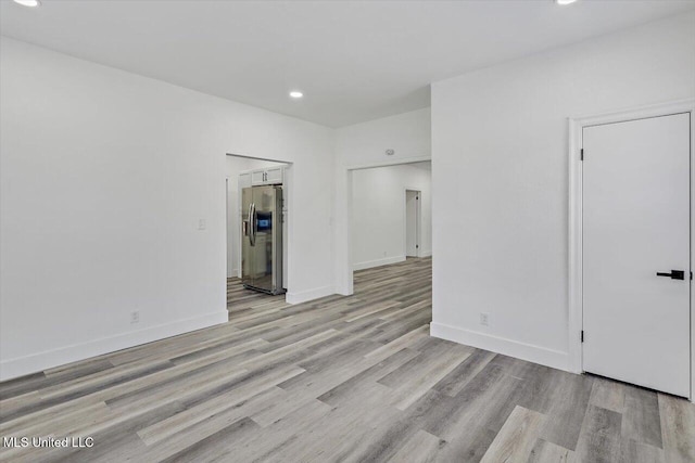 4560 Meadowridge Dr, Jackson, MS 39206 - interior space featuring recessed lighting, light wood-style flooring, and baseboards