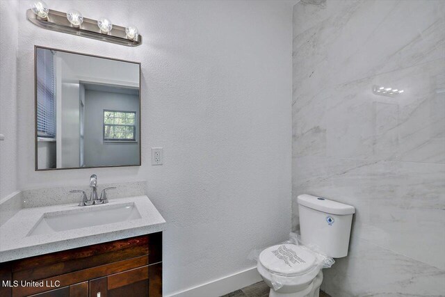 4560 Meadowridge Dr, Jackson, MS 39206 - bathroom featuring vanity and toilet