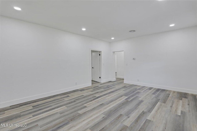 4560 Meadowridge Dr, Jackson, MS 39206 - spare room featuring recessed lighting, light wood-style flooring, and baseboards