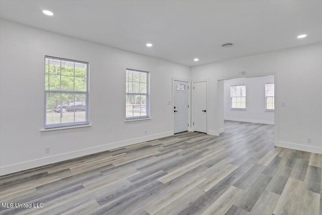 4560 Meadowridge Dr, Jackson, MS 39206 - interior space featuring light wood-type flooring, a healthy amount of sunlight, and recessed lighting