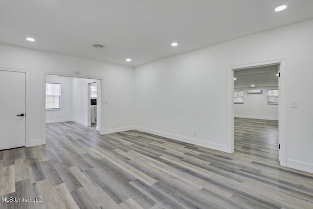 4560 Meadowridge Dr, Jackson, MS 39206 - spare room featuring wood finished floors, baseboards, and recessed lighting