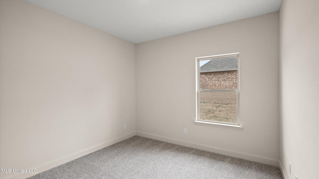 unfurnished room with carpet floors