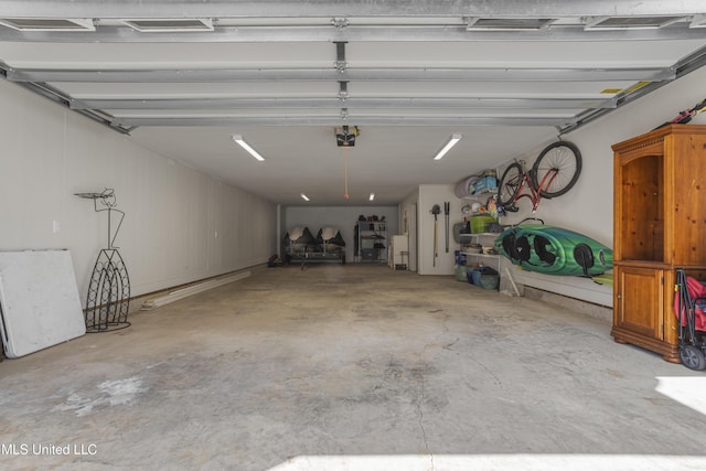 garage featuring a garage door opener