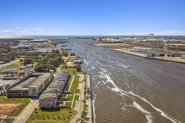 drone / aerial view with a water view